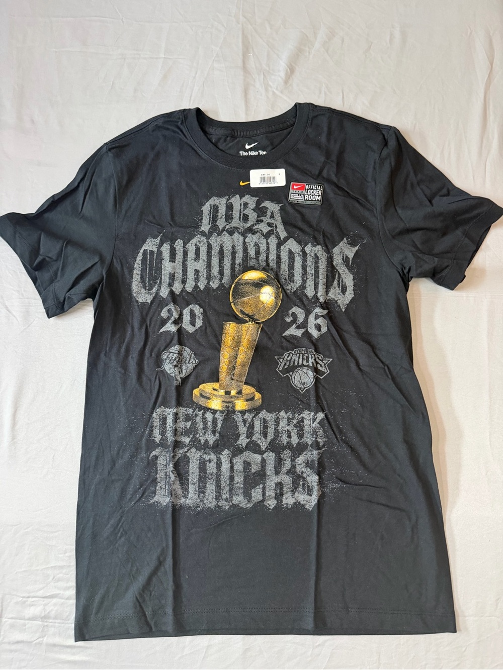 Nike Black New York Knicks NBA Champions Graphic Tee with Gold Trophy